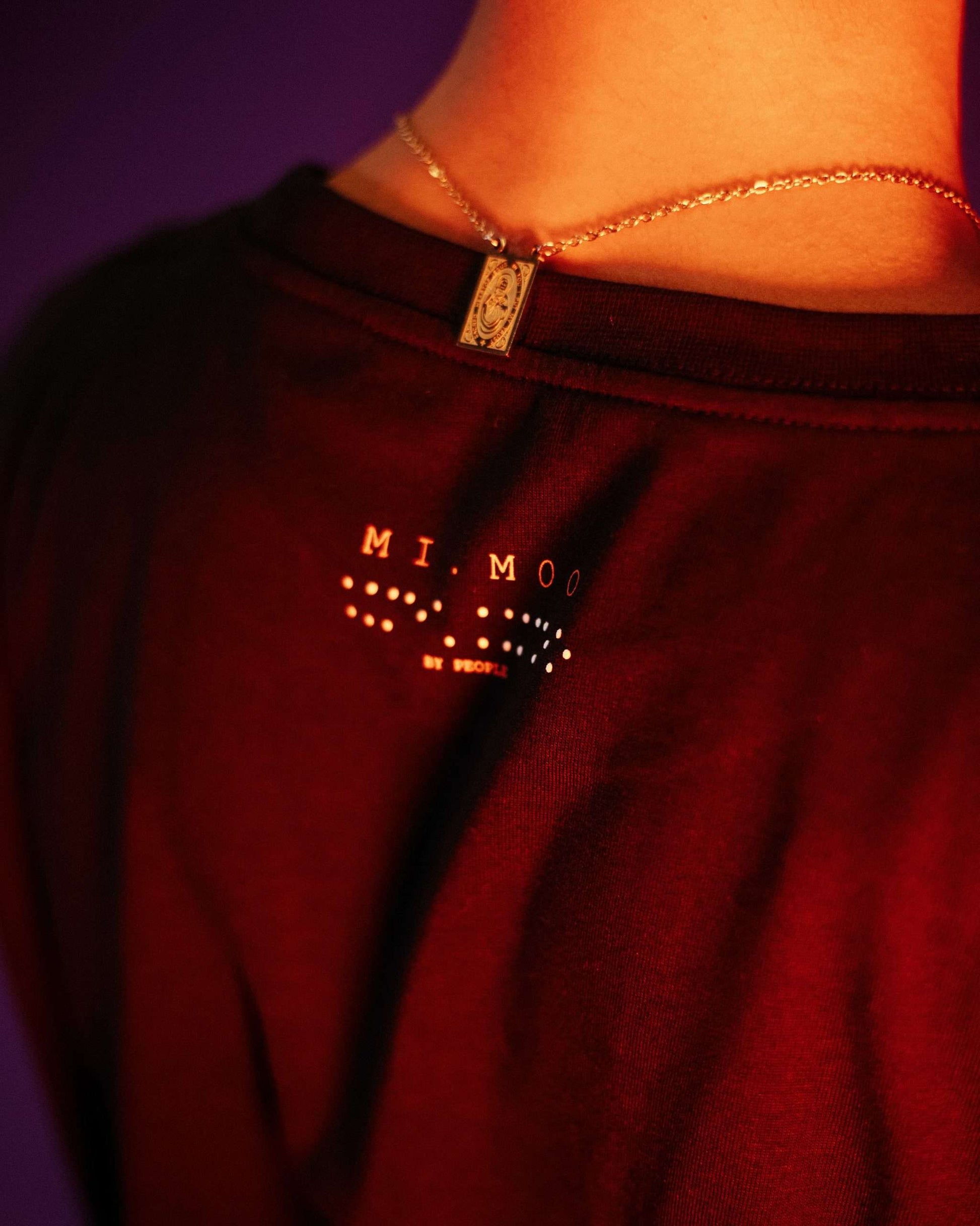 Black t-shirt with MIMOO small logo on the top back