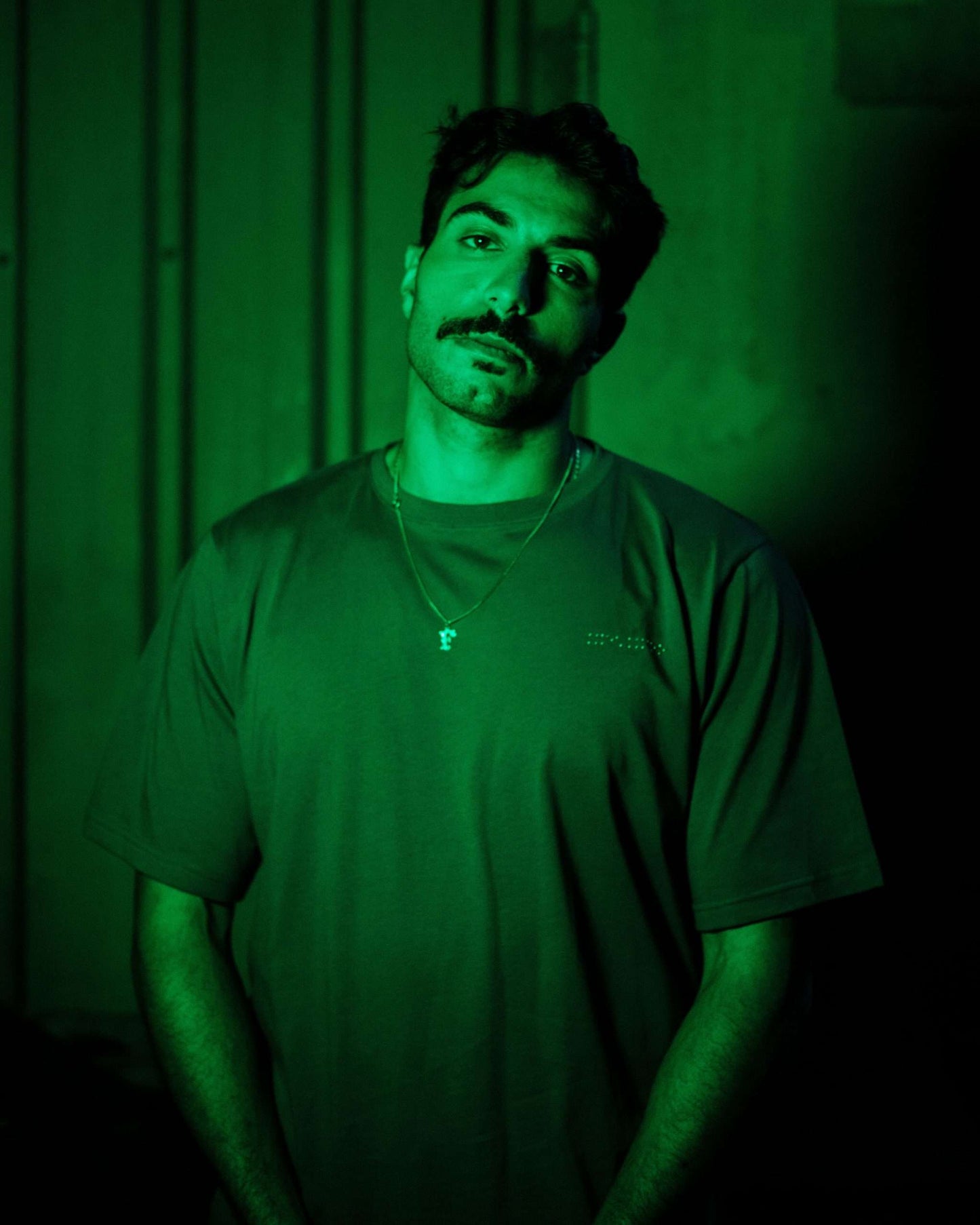 Green t-shirt with MIMOO small logo on the front