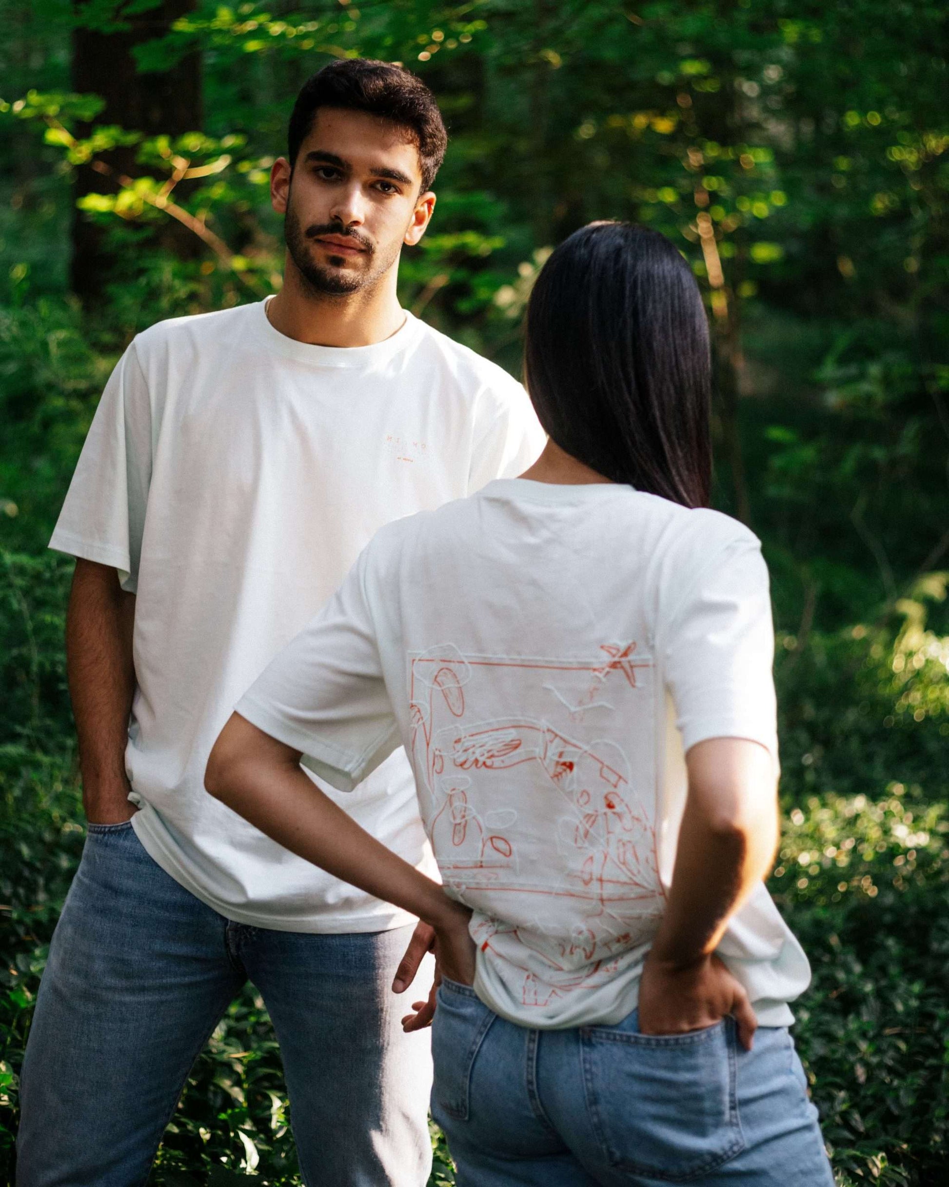 Blue t-shirt with illustration on the back and MIMOO small logo on the front